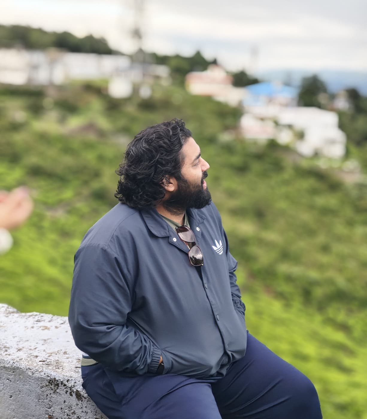 A ReGoBs engineer at a viewpoint in the hills